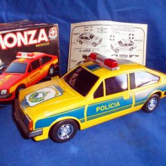 Carrinho Bate e Volta Monza Polícia Amarelo Anos 80 na caixa