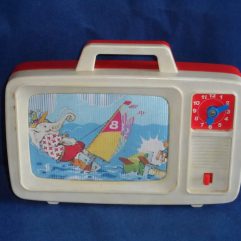 Brinquedo Antigo Musical Em Forma De Tv Com Relojionho